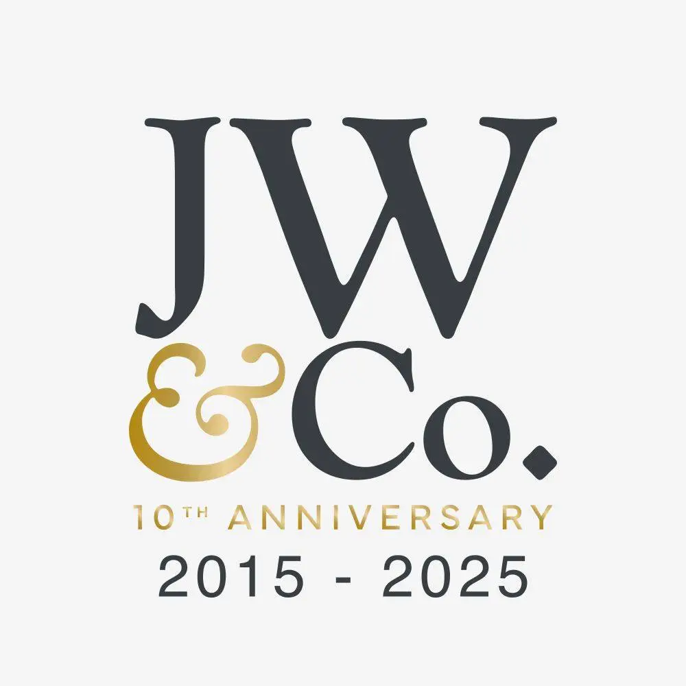 Logo of JW & Co. celebrating 10th anniversary from 2015 to 2025, featuring elegant typography and gold accents, symbolizing business growth and success.